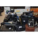 A mixed lot of vintage and retro cameras and camcorders including model D Brownie, Praktica and