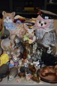 A collection of animal figurines and novelty biscuit barrels.