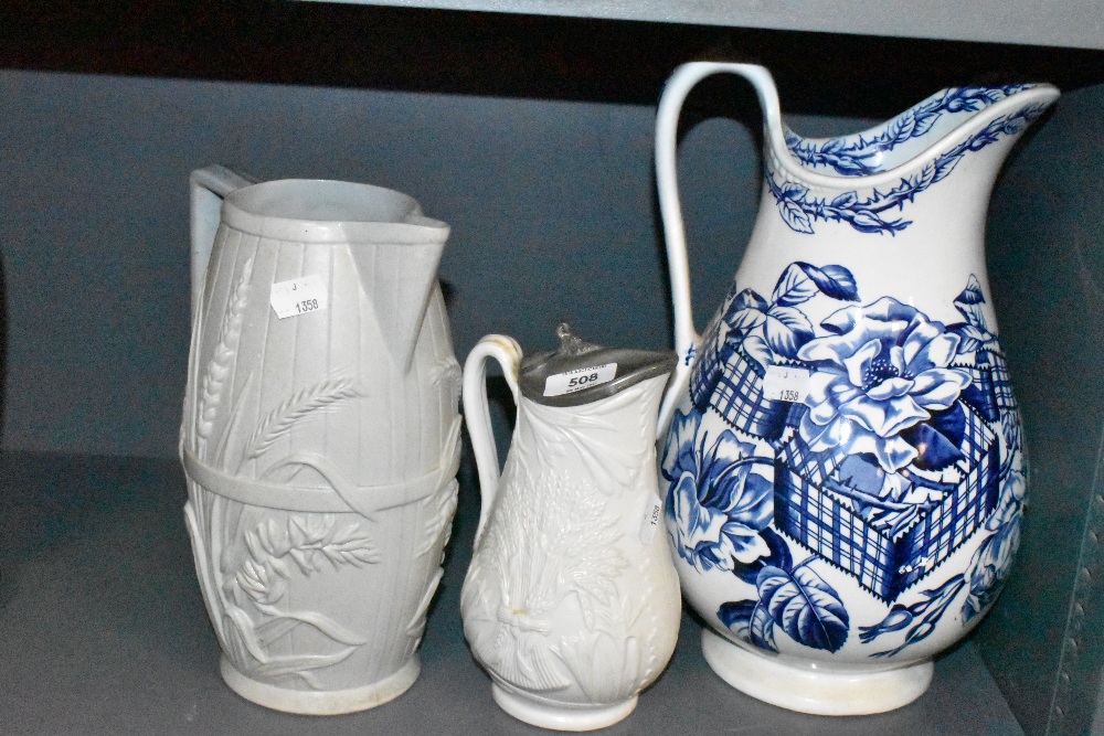 A selection of large antique ceramic water jugs including Victorian lozenge stamped