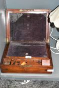 A mahogany cased writers compendium having compartmental inner