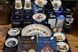 A selection of Aynsley Royal commemorative china and two reference books.