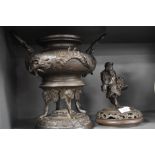 A Japanese bronze incense burner or lidded Koro having Samurai figure lid and dragon decorated body