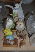 A selection of bird figurines including Whyte and Mackay Royal Doulton Merlin, USSR wrens and more.