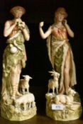 A pair of shepherd figures by Royal Dux having stamp to base one figure having slight damage