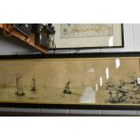 A large framed embroidery depicting seascape with windmills and houses to foreground.