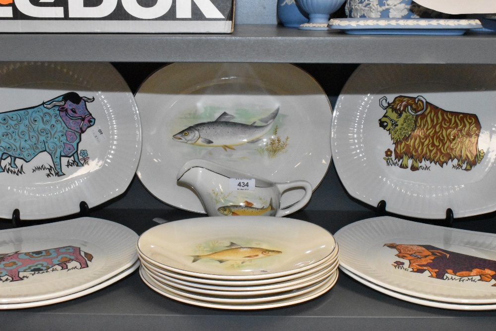 A selection of mid century meat chargers by Iron Stone pottery Beefeater and similar Wedgwood fish