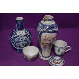 A selection of Chinese export porcelain including tea bowl and chocolate cup both in fine