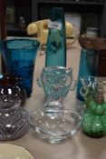 A selection of art glass including teal blue vase and Adrian Sankey squat vase.