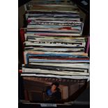 A large assortment of 45rpm singles including Bruce Springsteen,Ram Jam and more.