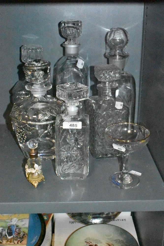 A selection of decanters and Babycham glass