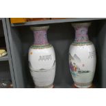 Two substantial floor standing Chinese export hard paste vase having Cantonese styled palette one