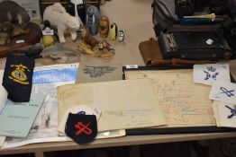 An assortment of Marine, Nautical and Airforce interest ephemera, badges and patches.