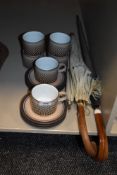 Six Hornsea pottery Coral cups and saucers, a vintage parasol and similar umbrella.