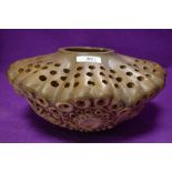 An unusual piece of studio art pottery having earthen ware body and naturalistic design most