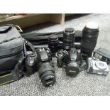 A selection of cameras, lenses and equipment including Nikon D3300 and Nikon Coolpix, a Nikkor AF-