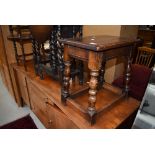 A traditional reproduction oak coffin stool style occasional table