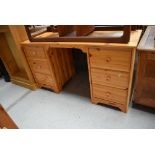 A vintage pine dressing table or desk