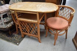 A wicker breakfast table and chair set