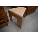 A vintage bent ply occasional table or stool of triangular form in the style of Bloom, max width