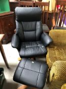 A vinyl swivel easy chair and footstool, similar to Stressless