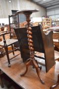 A Victorian stained frame wine table having twist column and triple splay legs