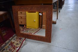 A vintage carved frame wall mirror