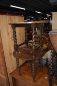 A pair of early to mid 20th Century oak circular small occasional tables having circular tops