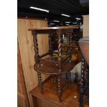 A pair of early to mid 20th Century oak circular small occasional tables having circular tops