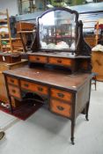 A late Victorian/Art Nouveau mahogany based dressing table having fruitwood drawer fronts with