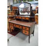 A late Victorian/Art Nouveau mahogany based dressing table having fruitwood drawer fronts with