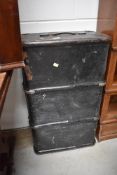 An antique had bodied and ribbed travel trunk or suitcase