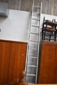 A set of aluminium extending ladders