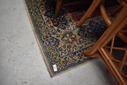 A traditional room size carpet square