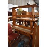 A pine kitchen table and two bench seats