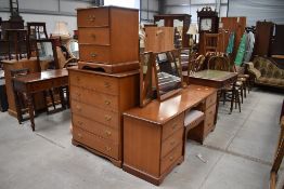 A selection of light stained Stag bedroom furniture comprising dressing table and two sets of