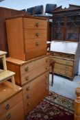 Two vintage teak and laminate bedroom chests of drawers, same design as the previous lot dressing