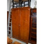 An early 20th Century mahogany wardrobe having semi fitted interior, approx. 108cm width including