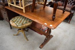 A traditional mid colour oak refectory style dining table, possibly Ercol , length approx. 140cm