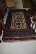 An Afghan style rug, having deep rich colours, approx. 200 x 105cm