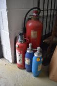 A selection of vintage and mid century fire extinguisher various designs and styles