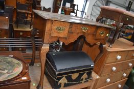 A period oak lowboy on Queen Anne style cabriole legs with pegged joints