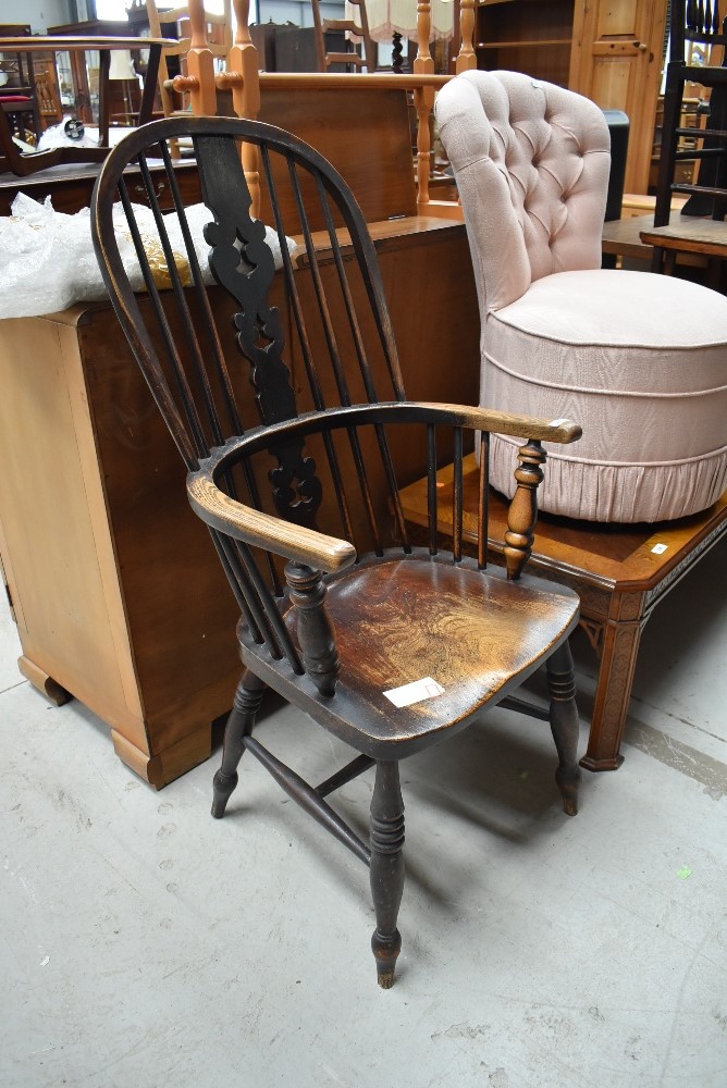 A 19th Century oak windsor style armchair