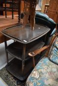 A dark stained Ercol tea trolley
