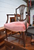 An antique mahogany framed carver chair