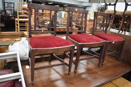 A set of three early 20th Century Regency style mahogany dining chairs