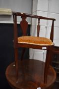 An antique mahogany framed salon or boudoir chair