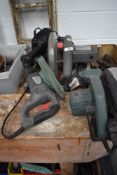 A selection of electric power tools including reciprocator saw jigsaw and mitre saw