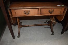 A reproduction coffee table with drawers