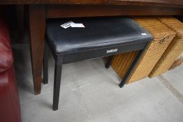 A Yamaha piano stool