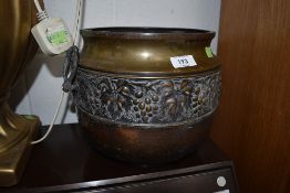 A Victorian pressed brass planter or vessel